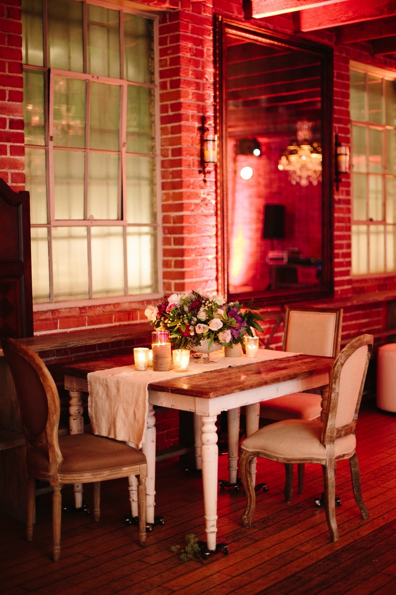 Rustic-Elegant Table
Photography: Heather Kincaid
Read More:
http://www.insideweddings.com/weddings/monique-lhuillier-operations-manager-hannah-lyons-unique-wedding/565/ Shabby chic wedding table with plush chairs and runner