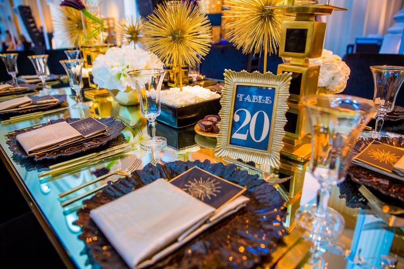 Art Deco Frames for Table Numbers
Photography: Laura Grier of Beautiful Day Photography
Read More:
http://www.insideweddings.com/weddings/glamorous-art-deco-inspired-wedding-in-downtown-los-angeles/1162/ art deco inspired wedding reception with black and gold, table numbers in frame