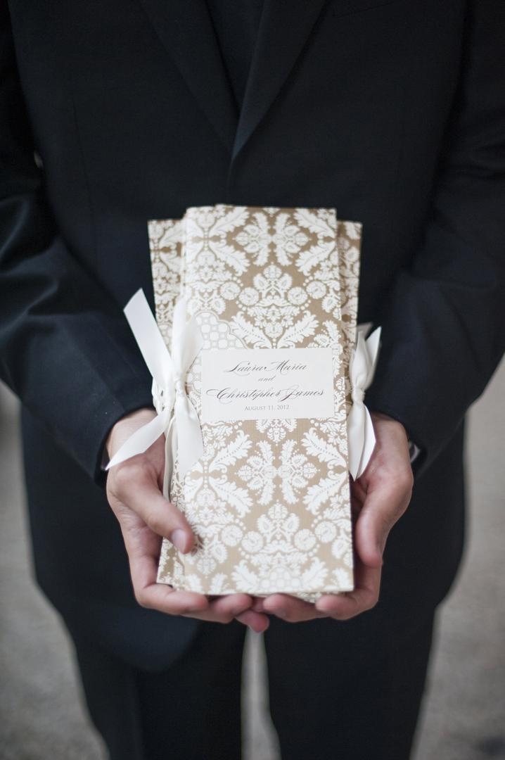 Gold Damask Program
Photography: Justin Marantz
Read More:
http://www.insideweddings.com/weddings/unforgettable-miami-wedding-with-acrobats-tiger-cubs-fireworks/437/ Gold and white damask print wedding ceremony program