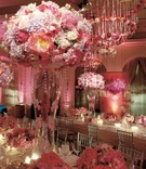 Pink Centerpieces
Photography: John Derryberry Photography
Read More:
http://www.insideweddings.com/weddings/glamorous-pink-ballroom-wedding-in-austin-texas/214/ tall and short arrangements of pink flowers in pink reception room