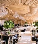Gold Reception Tent with Chandeliers
Photography: Parker J Pfister Photographer
Read More:
http://www.insideweddings.com/weddings/gorgeous-alfresco-ceremony-tented-reception-at-a-luxurious-estate/1044/ Wedding reception tent gold fabric chandeliers black linens green centerpieces gold chairs