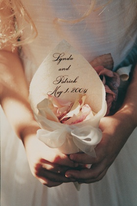 Paper Cone Petal Holder
Photography: Isabel Lawrence Photographers
Read More:
http://www.insideweddings.com/weddings/romantic-seaside-wedding-at-the-biltmore-in-santa-barbara/76/ Flower girl holds ivory cone filled with petals