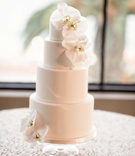 Simple and Small White Wedding Cake, Orchids
Photography: Laurie Bailey Photography
Read More:
http://www.insideweddings.com/weddings/classic-california-wedding-with-american-and-chinese-traditions/900/ simple small white wedding cake orchids for levels sequin table cloth california wedding bel-air bay
