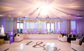Theresa %26 Brendan's Reception
Photography: Old South Studios
Read More:
http://www.insideweddings.com/weddings/retired-nba-player-brendan-haywoods-bold-modern-wedding/1381/ wedding reception brendan haywood dance floor head table white flowers overhead drapery tent