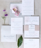 Rose-Print Invitation Suite
Photography: Brian Leahy Photography
Read More:
http://www.insideweddings.com/weddings/alfresco-ceremony-with-sweeping-ocean-views-tented-reception/1112/ invitation suite with pink rose print, grey lettering and envelope, belly band