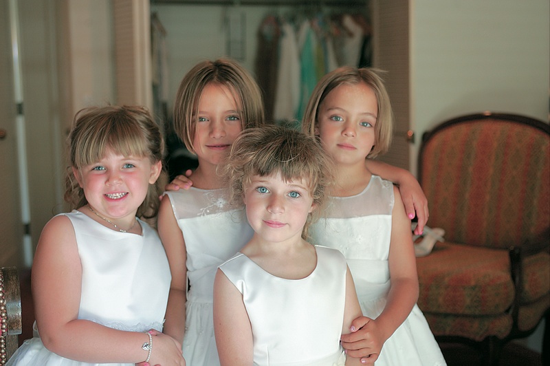 Flower Girls in White
Photography: Asgeir Bollason for David Michael Photography
Read More:
http://www.insideweddings.com/weddings/pink-green-memorial-day-weekend-wedding-in-palm-desert/128/ Little blonde girls with blue eyes and ivory gowns