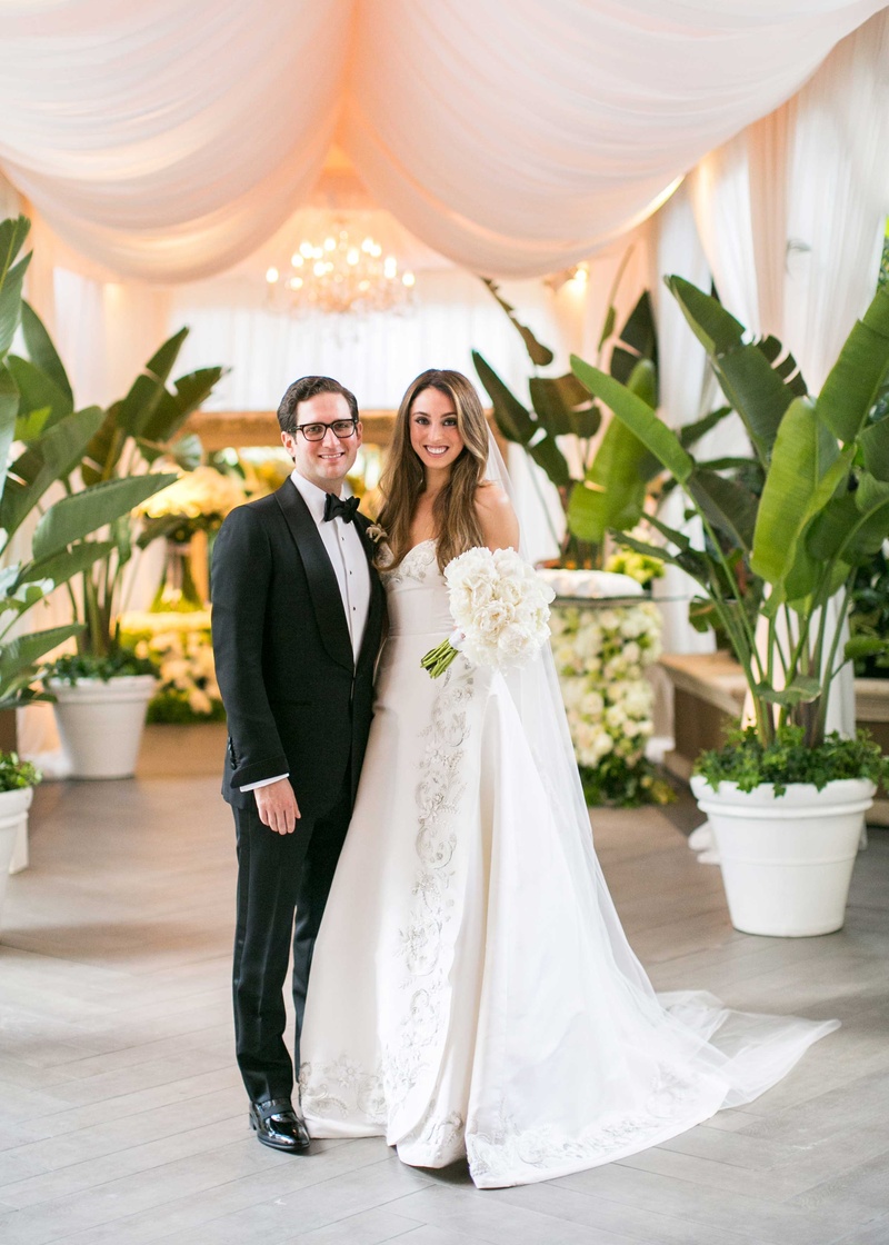Beverly Hills Bride %26 Groom Portrait
Photography: Samuel Lippke Studios
Read More:
http://www.insideweddings.com/weddings/romantic-jewish-wedding-with-lush-ivory-flowers-rose-gold-details/790/ Bride in Oscar de la Renta wedding dress with white peony bouquet groom in tuxedo bow tie by drapery