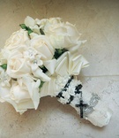 Sentimental Bridal Bouquet
Photography: Lawrence Crandall Photography
Read More:
http://www.insideweddings.com/weddings/fall-inspired-california-wedding-nyc-themed-after-party/212/ All-white flowers wrapped in lace and rosary