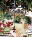 Cross Ceremony Decorations
Photography: Handeland Tesoro Photography
Read More:
http://www.insideweddings.com/weddings/old-world-inspired-wedding-in-california/163/ Wrought iron cross hanging from outdoor ceremony structure
