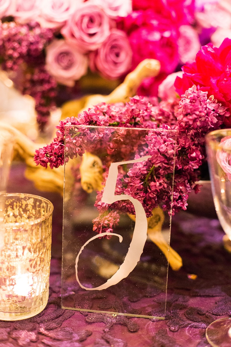 Pink and Purple Floral Centerpieces and Clear Table Number
Photography: Katie Stoops Photography
Read More:
http://www.insideweddings.com/weddings/bright-playful-oceanfront-wedding-with-delectable-four-course-menu/757/ pink and purple floral centerpieces roses clear glass table number small candle