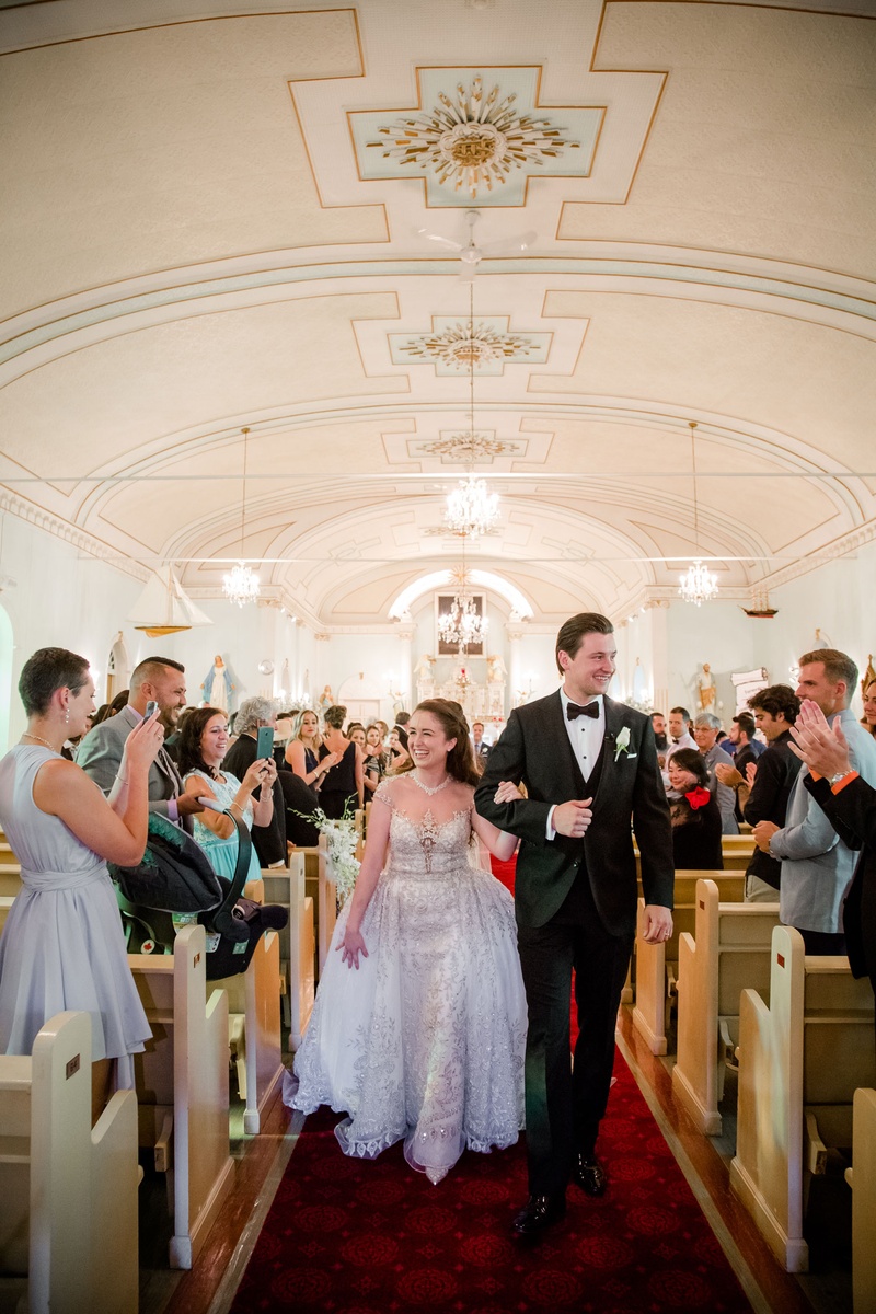 Bride %26 Groom Walking Up Church Aisle
Photography: Magnolia Studio
Read More:
http://www.insideweddings.com/weddings/charming-church-ceremony-romantic-ballroom-reception-in-quebec/1075/ Bride in Kleinfeld Bridal beaded illusion ball gown on arm of husband in tuxedo walking up aisle
