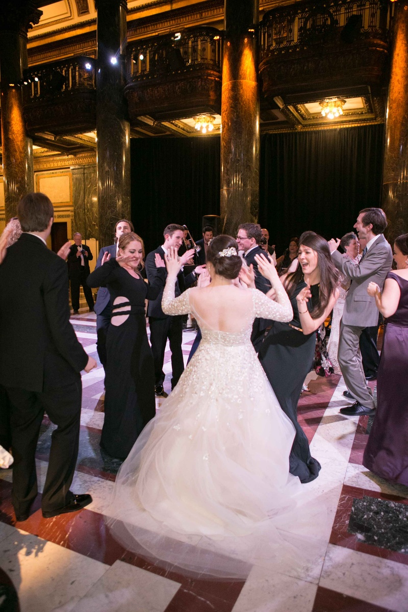 Bride Twirling at Wedding Reception
Photography: Joey Kennedy Photography
Read More:
http://www.insideweddings.com/weddings/classically-elegant-catholic-wedding-in-pittsburgh-pennsylvania/909/ bride twirling dress wedding reception liancarlo low back long sleeves spinning catholic wedding