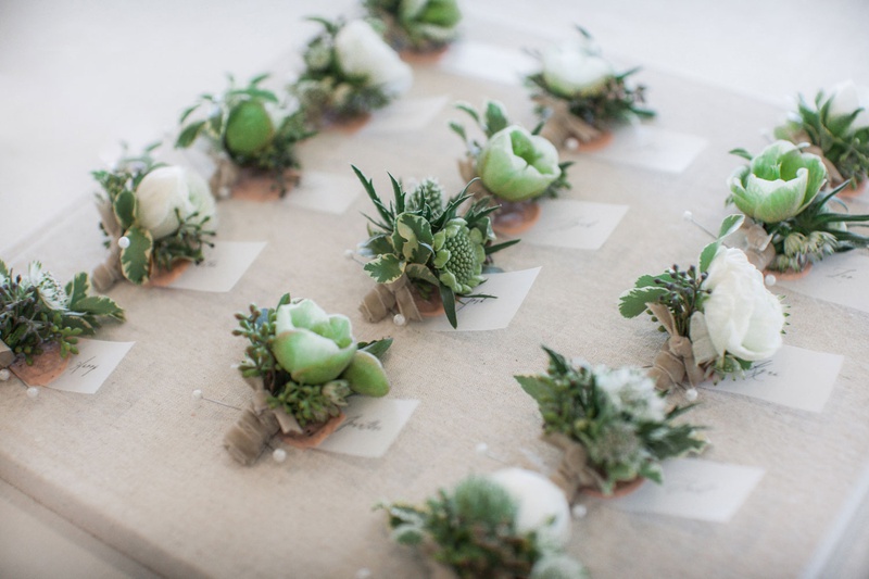 White + Green Boutonnieres
Photography: Clane Gessel Photography
Read More:
http://www.insideweddings.com/weddings/ocean-view-ceremony-with-cultural-traditions-elegant-reception/1291/ wedding boutonniere white green flowers greenery tan velvet ribbon