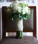 Rustic Bridal Bouquet
Photography: D. Park Photography
Read More:
http://www.insideweddings.com/weddings/rustic-spring-wedding-in-southern-california/454/ White rose bouquet with green leaves and twine