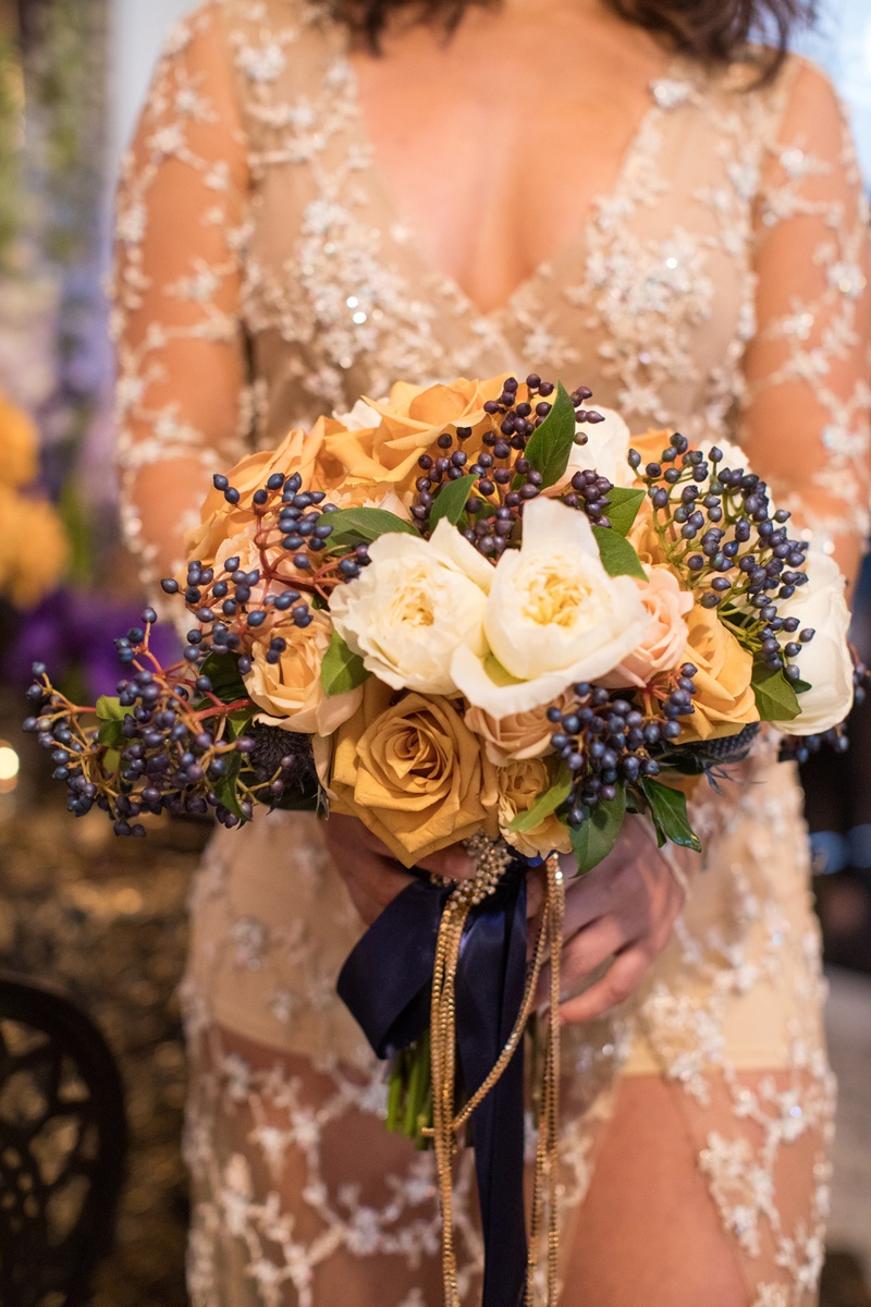 Fall Bouquet with Berries
Photography: Duke Photography
Read More:
http://www.insideweddings.com/weddings/dramatic-tablescape-at-launch-party-for-luxe-linens-newest-line/987/ fall bridal bouquet, amber roses, navy berries