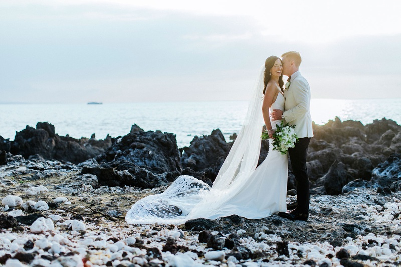 Big Island, Hawaii Wedding Portrait
Photography: Chris J. Evans Photography
Read More:
http://www.insideweddings.com/weddings/outdoor-winter-ceremony-and-reception-on-the-big-island-in-hawaii/1306/ wedding portrait couple photo on lava rocks big island hawaii waimea venue crepe dress long veil