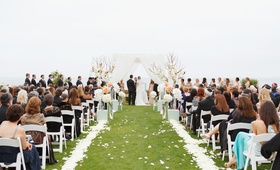 Oceanfront Ceremony Décor
Photography: Marisa Holmes
Read More:
http://www.insideweddings.com/weddings/seafoam-ivory-hued-oceanfront-wedding-in-laguna-beach-california/431/ Alfresco wedding with petal-lined aisle