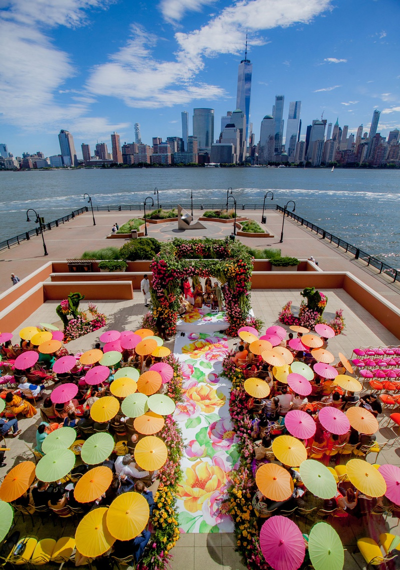 Colorful Parasols at City-View Ceremony
Photography: Clane Gessel Photography
Read More:
http://www.insideweddings.com/weddings/colorful-city-view-wedding-featuring-indian-and-japanese-traditions/1353/ wedding ceremony in new jersey with view of new york city skyling pink yellow green parasols