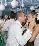 Newlyweds Dance at Wedding
Photography: John Solano Photography
Read More:
http://www.insideweddings.com/weddings/tented-beach-wedding-in-malibu-california/24/ Bride and groom dance with guests at beach tent wedding