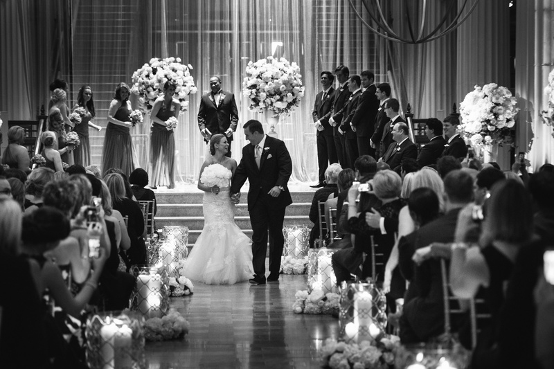 Bride and Groom Recessional
Photography: J. Cogliandro Photography
Read More:
http://www.insideweddings.com/weddings/angela-mecca-and-owen-daniels/540/ Black and white photo of couple walking up aisle