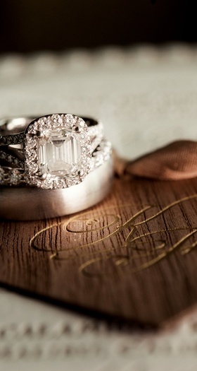 Couple's Wedding Rings
Photography: Laurie Bailey Photography
Read More:
http://www.insideweddings.com/weddings/shabby-chic-garden-inspired-malibu-california-wedding/562/ Emerald-cut diamond halo in split-shank ring