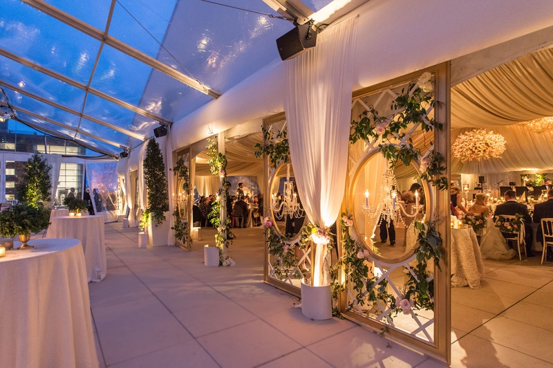 View from Cocktail Hour to Reception
Photography: Carasco Photography
Read More:
http://www.insideweddings.com/weddings/traditional-ceremony-glamorous-garden-inspired-tented-reception/943/ Tent wedding view from cocktail hour space into reception ballroom drapery and open clear top tent