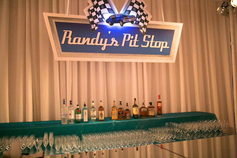 Randy's Pit Stop
Photography: Marianne Lozano Photography
Read More:
http://www.insideweddings.com/weddings/pink-white-wedding-with-ombre-details-at-montage-laguna-beach/686/ Men's bar area at wedding styled to look like Nascar