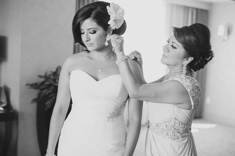 Mother of the Bride
Photography: Jasmine Star Photography
Read More:
http://www.insideweddings.com/weddings/spanish-style-ceremony-outdoor-ranch-wedding-reception/504/ Black and white photo of mother adding earrings to bride