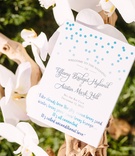 Ceremony Program with Blue Polka Dots
Photography: Brian Leahy Photography
Read More:
http://www.insideweddings.com/weddings/beachy-southern-california-ceremony-winter-wonderland-reception/877/ shades of blue text on ceremony program polka dots, romantic quote
