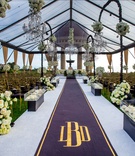 Gold %26 Black Monogrammed Aisle Runner
Photography: Curtis Dahl Photography
Read More:
http://www.insideweddings.com/weddings/luxury-wedding-with-an-art-deco-theme-in-southern-california/1122/ Wedding ceremony resort at pelican hill tent clear with flower chandeliers black gold aisle runner