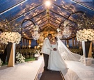 Couple Kissing in Ceremony Tent