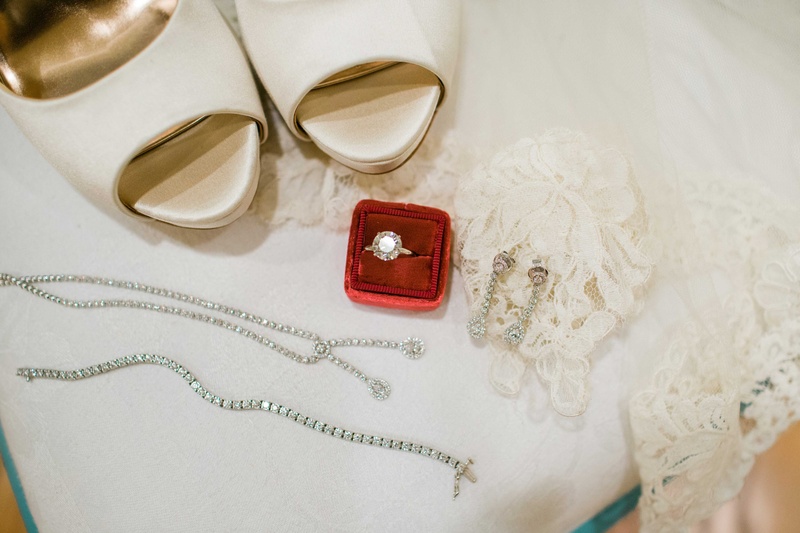 White Shoes, Red Ring Box, Lace Accoutrements
Photography: Jenny Quicksall Photography
Read More:
http://www.insideweddings.com/weddings/romantic-wedding-shoot-for-valentines-day-at-california-vineyard/751/ white high heeled shoes white lace red ring box silver jewelry ring bracelets earrings necklace