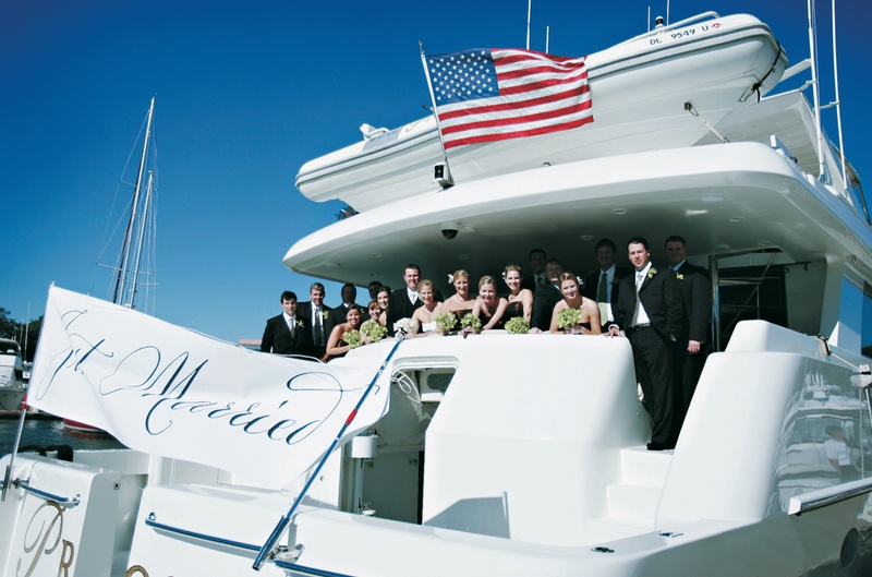 Wedding Party on Boat
Photography: Tamara Lackey Photography
Read More:
http://www.insideweddings.com/weddings/lime-green-hued-fall-wedding-in-south-carolina/219/ Charter ferry with American flag and Just Married