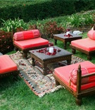 Moroccan-Inspired Lounge Furniture
Photography: James Johnson Photography
Read More:
http://www.insideweddings.com/weddings/intimate-moroccan-themed-chateau-wedding-in-california/323/ Outdoor seating with red pillows and rugs