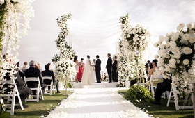All-White Ceremony Décor
Photography: Aaron Delesie Photographer
Read More:
http://www.insideweddings.com/weddings/all-white-beach-ceremony-sophisticated-ballroom-reception/364/ Outdoor wedding at Montage Laguna Beach