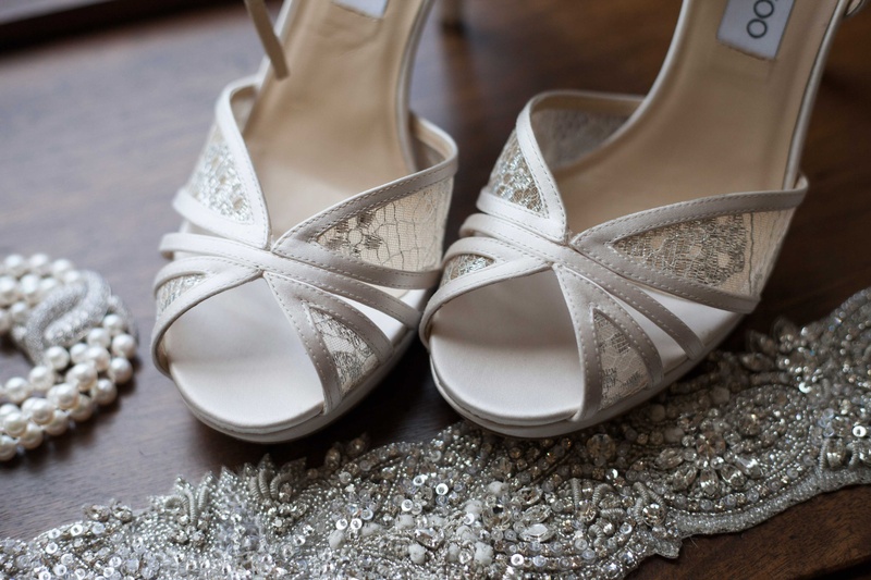 Lace High Heels and Pearls
Photography: Michael Bambino %26 Co.
Read More:
http://www.insideweddings.com/weddings/whimsical-open-air-secret-garden-wedding-with-soft-spring-hues/777/ lace jimmy choo high heels sitting next to a delicate pearl necklace