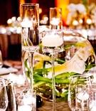 Tall Floating Candles
Photography: True Photography Weddings
Read More:
http://www.insideweddings.com/weddings/meaghan-hunt-and-steve-finley/434/ Large crystal candlesticks filled with water