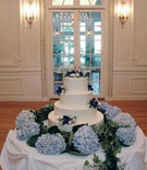 Classic White Wedding Cake
Photography: A Perfect Image
Read More:
http://www.insideweddings.com/weddings/greek-orthodox-wedding-at-endicott-college-in-massachusetts/252/ Wedding cake with blue flower deecorations
