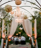 Bohemian Outdoor Reception
Photography: Elizabeth Messina
Read More:
http://www.insideweddings.com/weddings/spring-garden-wedding-in-montecito-california/277/ Alfresco drapery, chandelier and pomander balls