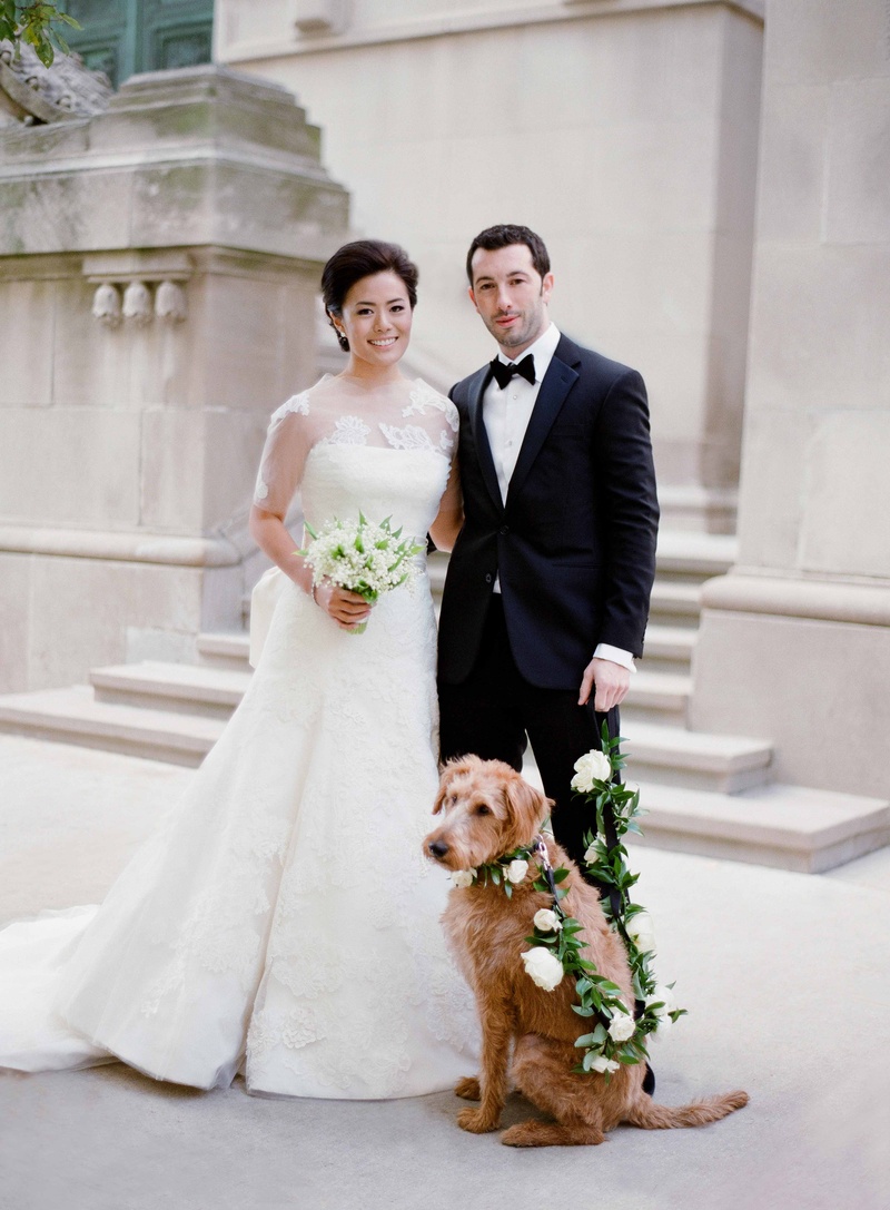 Chicago Couple with Sweet Pup
Photography: Jose Villa Photography
Read More:
http://www.insideweddings.com/weddings/glamorous-sophisticated-garden-themed-ballroom-wedding-in-chicago/905/ Bride in Vera Wang wedding dress holding bouquet lily of the valley groom tuxedo dog with leash