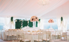 Glam Tented Wedding with Hedge Wall
Photography: Lauren Gabrielle Photography
Read More:
http://www.insideweddings.com/weddings/lovely-country-club-summer-wedding-with-tent-reception-in-ohio/1018/ Wedding reception green hedge wall flowers tall centerpieces gold chairs reception decor ideas