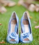 Something Blue Heels
Photography: Jana Williams Photography
Read More:
http://www.insideweddings.com/weddings/ivory-gold-blush-lakefront-new-hampshire-wedding/412/ Peep-toe pumps with rosette in light blue for wedding