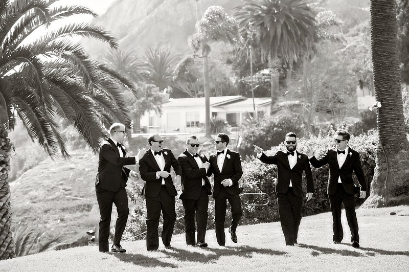 Black and White Photo of Groomsmen Pointing
Photography: Laurie Bailey Photography
Read More:
http://www.insideweddings.com/weddings/oceanfront-wedding-ceremony-classic-romantic-ballroom-reception/854/ black and white photo of groomsmen pointing groom golf course palm trees california wedding