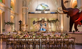 Reception by Dinosaur Skeleton
Photography: Kent Drake Photography
Read More:
http://www.insideweddings.com/weddings/an-event-planners-wedding-at-a-museum-by-sue-the-tyrannosaurus-rex/955/ Wedding reception at The Field Museum in front of Sue the T Rex dinosaur and mammoth elephant