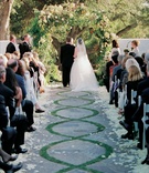 Courtyard Wedding Ceremony
Photography: John Solano Photography
Read More:
http://www.insideweddings.com/weddings/outdoor-courtyard-wedding-at-ojai-valley-inn-spa/143/ Bride and groom stand at end of stone and grass patterned aisle