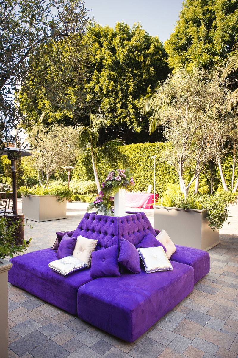 Bright Purple Lounge Furniture
Photography: Callaway Gable
Read More:
http://www.insideweddings.com/weddings/modern-in-the-round-ceremony-whimsical-garden-inspired-reception/1155/ Outdoor wedding cocktail hour vibiana purple settee bench lounge furniture silver pillows