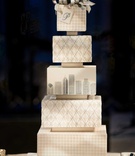 Chicago Skyline Wedding Cake
Photography: Studio This Is
Read More:
http://www.insideweddings.com/weddings/glamorous-city-style-real-wedding-at-a-luxury-hotel-in-chicago/1217/ wedding cake with houndstooth and argyle pattern layers chicago skyline bow cake topper