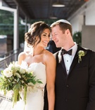 Smiling for the Future
Photography: Vue Photography
Read More:
http://www.insideweddings.com/weddings/romantic-rustic-chic-wedding-at-a-whiskey-distillery-in-atlanta/942/ bride and groom smile and hold hands with white and green bouquet and yamulke