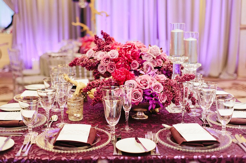 Vibrant Pink and Purple Tablescapes for a Reception
Photography: Katie Stoops Photography
Read More:
http://www.insideweddings.com/weddings/bright-playful-oceanfront-wedding-with-delectable-four-course-menu/757/ pink and purple floral arrangements centerpieces purple linens glass plateware reception