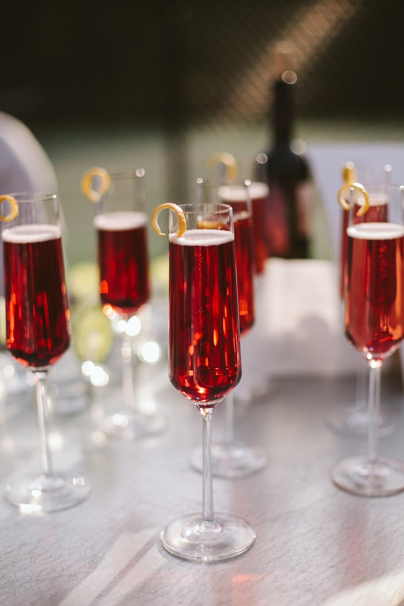 Champagne Cocktail
Photography: David %26 Tammy Molnar
Read More:
http://www.insideweddings.com/weddings/an-exquisite-backyard-wedding-in-tennessee/532/ Signature cocktails in champagne flutes with rind